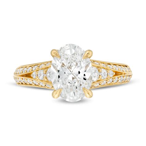 Marquise-cut lab-created diamonds sparkle along the shank while. . Kleinfeld x zales